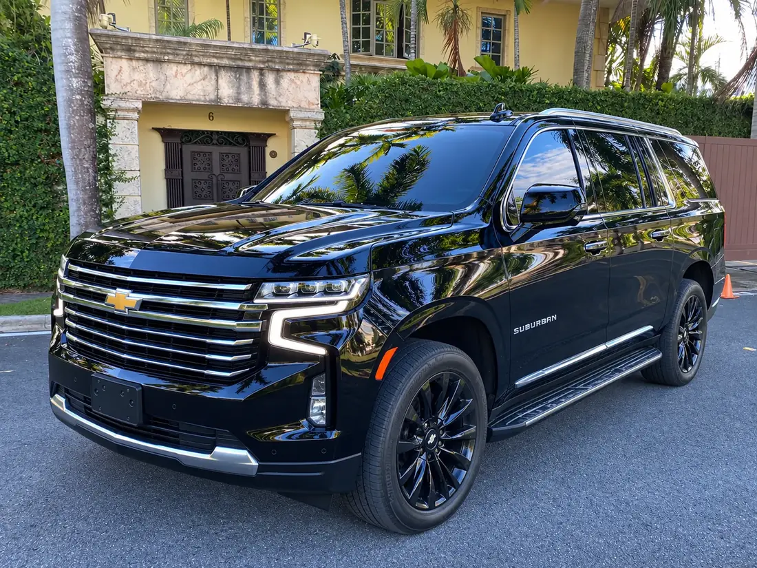 Black Chevrolet Suburban at a private villa entrance in Punta Cana