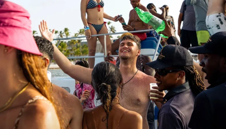 Guests celebrating with drinks during the party on board in Punta Cana