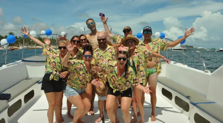 Group in tropical shirts posing on deck in Punta Cana