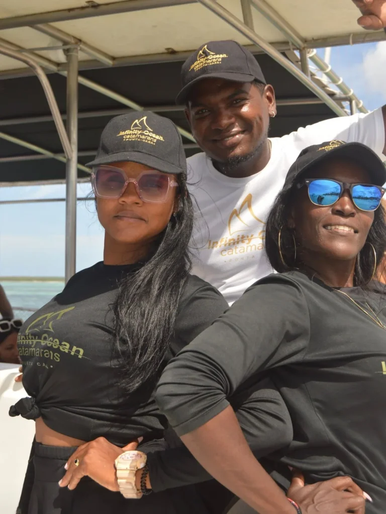 Two crew members in the boat command area in Punta Cana