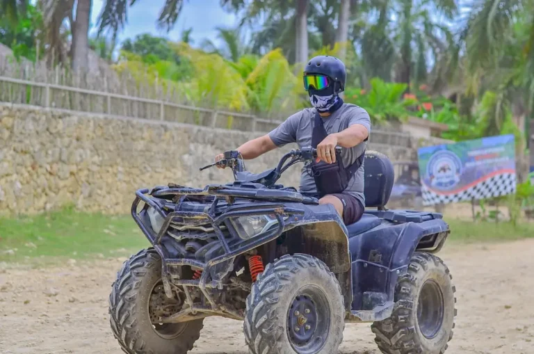 Line of ATVs on an open country road during the Punta Cana ride