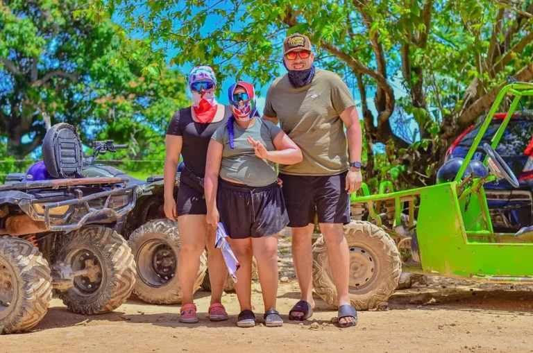 Group of guests in helmets beside their ATVs in Punta Cana
