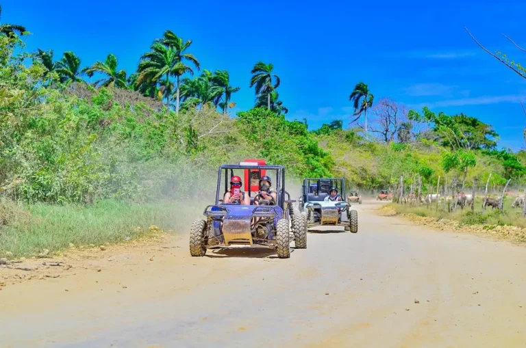 Line of buggies on a dirt road through the Punta Cana countryside