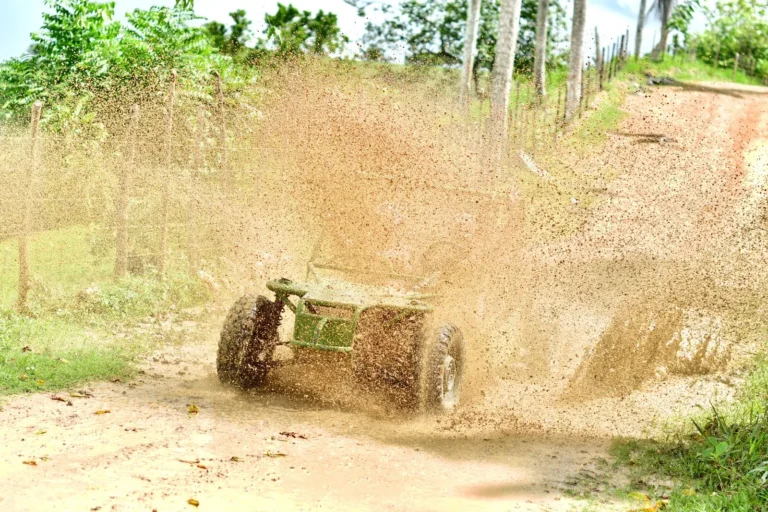 Buggy splashing through a mud puddle at La Hacienda Park