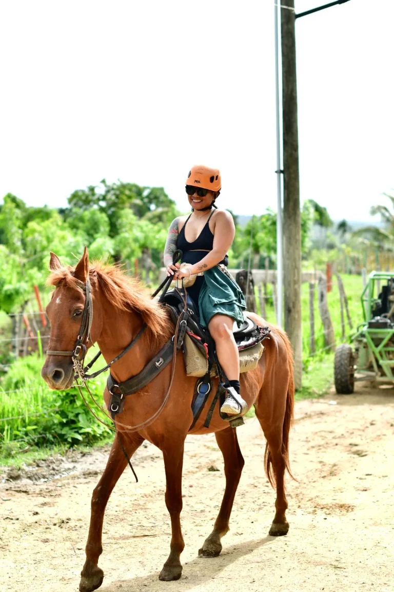 Guest on horseback on a country road at La Hacienda Park
