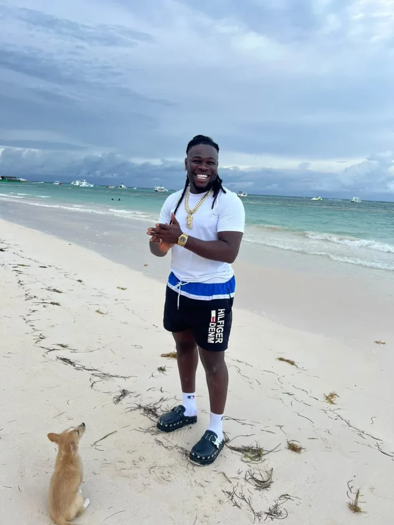 Yobi Junior, founder and host of King Black Tour & Travel, on the beach in Punta Cana