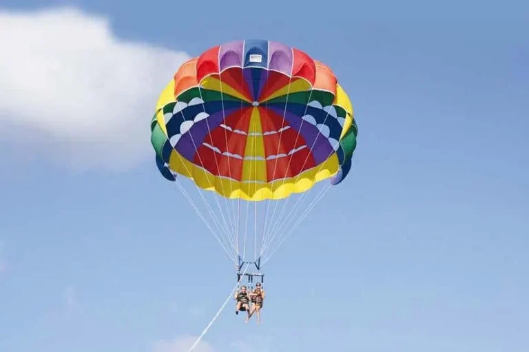 Colorful parasail against the blue sky in Punta Cana
