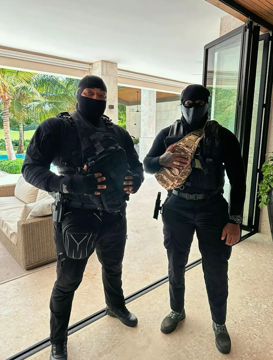 Two protection officers of the King Black detail at a private villa in Punta Cana