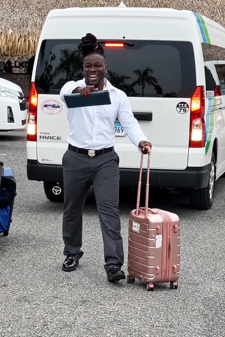 Yobi Junior, founder and host of King Black Tour & Travel, on the beach in Punta Cana
